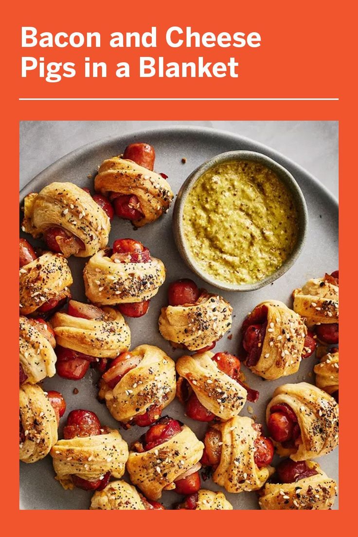 bacon and cheese pigs in a blanket on a plate next to a bowl of dip