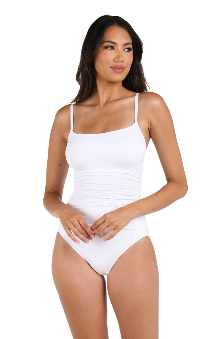 Sunbathe seaside in this lingerie one-piece swimsuit by La Blanca. The delicate and simple lingerie shape exudes a simple, feminine style. Adjustable straps and removable cups allow this piece to fit to you. Slimming fabric finishes the smooth, delicate look. Moderate rear coverage. [split] Details One piece swimsuit Shirred side seams Removable cups Adjustable straps Fabric 83% Nylon, 17% Elastane Elegant Swimwear With Spaghetti Straps For Sunbathing, Elegant Spaghetti Strap Swimwear For Sunbathing, Swimming Bodysuit With Spaghetti Straps And Lined Body, Elegant Beach Swimwear With Spaghetti Straps, Elegant Spaghetti Strap Swimwear For Beach, Elegant Vacation Camisole With Adjustable Straps, Elegant Summer Lined Camisole, White Underwire Bodysuit For Swimming, Summer Bodysuit With Spaghetti Straps And Lined Body