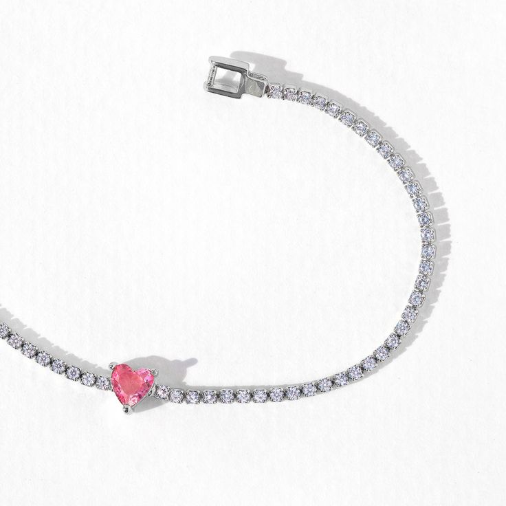 A modern twist on a timeless piece, this classic tennis bracelet features a gorgeous gradient of heart-shaped studs at its center. Trust us when we say that you'll be reaching for this one over and over. Valentine's Day Bracelets With Heart Charm And Cubic Zirconia, Valentine's Day Bracelet With Heart Charm And Cubic Zirconia, Heart Shaped Adjustable Tennis Bracelet Gift, Heart Shaped Adjustable Tennis Bracelet As Gift, Heart-shaped Adjustable Tennis Bracelet As Gift, Adjustable Heart-shaped Tennis Bracelet As Gift, Trendy Silver Cubic Zirconia Tennis Bracelet, Valentine's Day Gift Tennis Bracelet With Cubic Zirconia, Valentine's Day Heart Bracelet In Cubic Zirconia