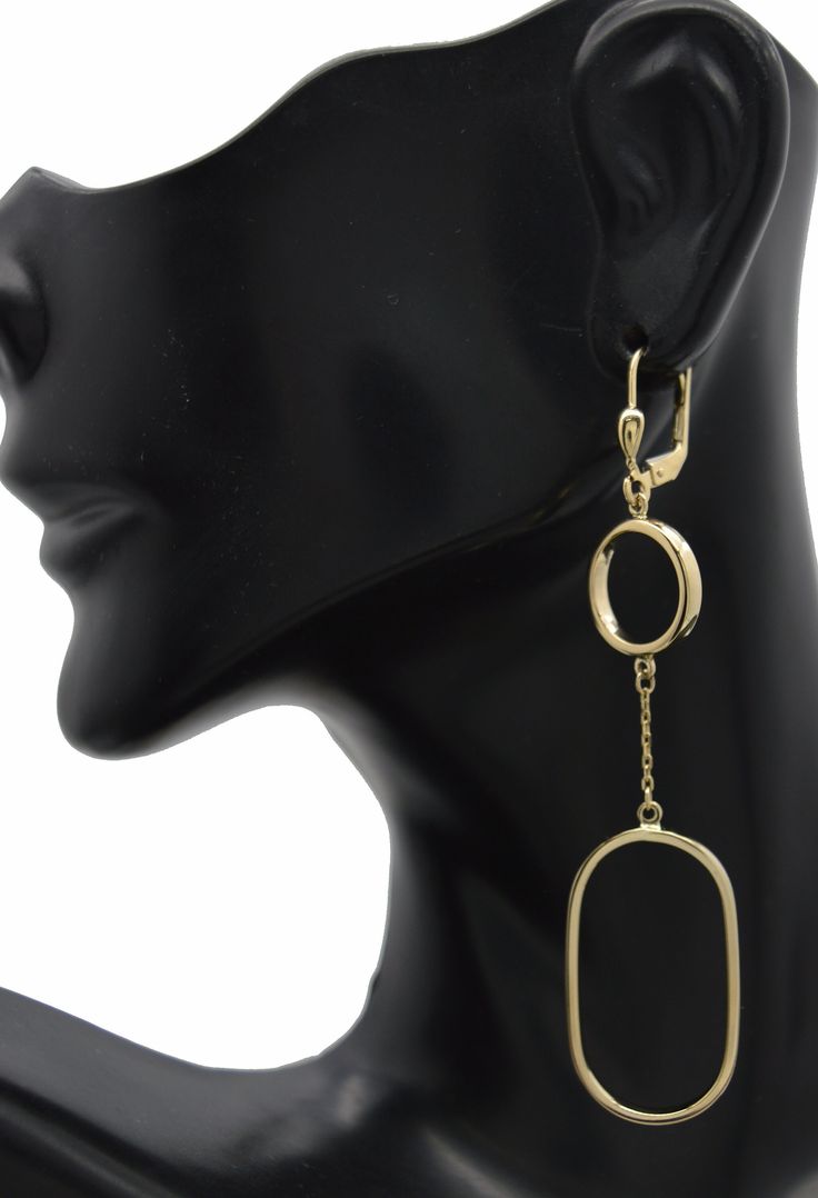 Our Real 14K Solid Yellow Gold Round & Paperclip Inspired Dangle Drop Earrings are the perfect way to make a timeless statement! Handcrafted from 14K yellow gold, these unique earrings will make you the envy of your friends. With each earring weighing 2.9 gr, you can make a bold yet delicate fashion statement. Make a statement with these dangle drop earrings today! Specifications: Metal: Real 14K Yellow Gold (Stamped, 14K) Condition: Brand New Polished: Shiny Weight: 2.9 grams Height: 2.85 inch Elegant Yellow Gold Clip-on Dangle Earrings, Formal Dangle Hoop Earrings Fine Jewelry, Elegant Stamped 14k Gold Dangle Earrings, Formal Yellow Gold Dangle Clip-on Earrings, Formal Clip-on Dangle Earrings, Yellow Gold Oval Metal Earrings, Yellow Gold Clip-on Dangle Jewelry, Elegant Gold-tone Dangle Clip-on Earrings, Yellow Gold Clip-on Dangle Earrings