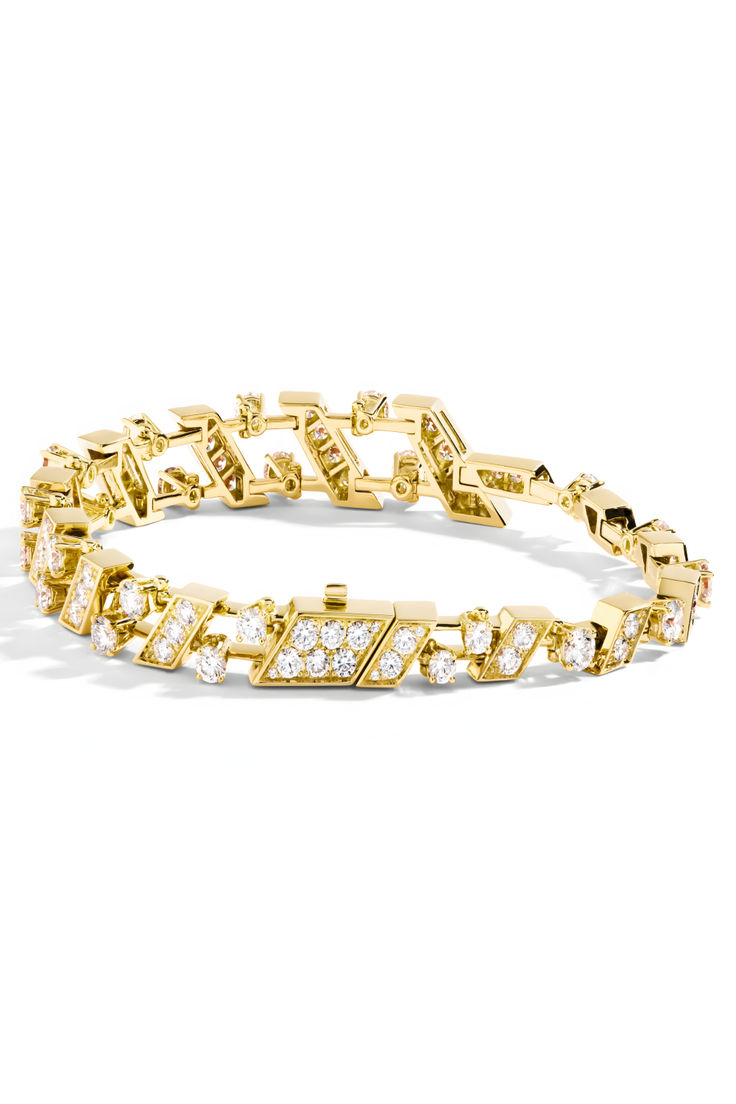 Luxurious diamond bracelet inspired by Fifth Avenue NYC. 18K Gold Fifth Avenue Diamond Bracelet. Asymmetrical lines and dazzling diamonds create a chic bracelet which enhances any look. Explore our Pinterest Board for more ideas and in-depth details on Marmalade. #ChicJewelry #Jewelry #JewelryFinds #FashionAccessories #StyleInspiration #FashionJewelry #TrendyFinds #JewelryAccessories #ChicAccessories #TrendyAdornments Fifth Avenue Nyc, Bracelet Inspired, Chic Bracelet, Necklace Ring, Fashion Statements, Chic Jewelry, Chic Accessories, Stunning Jewellery, Unique Charms