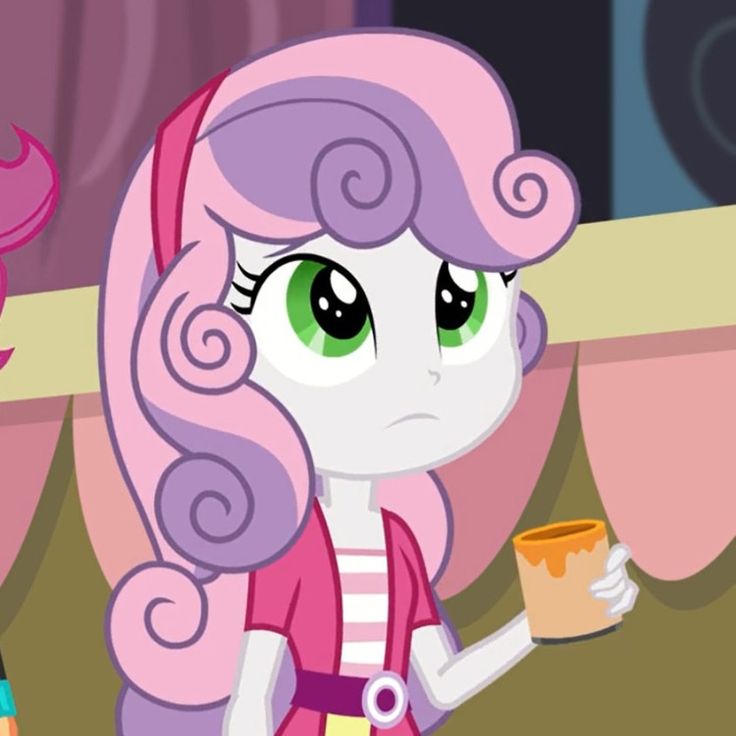 the pinkie is holding a cup in her hand