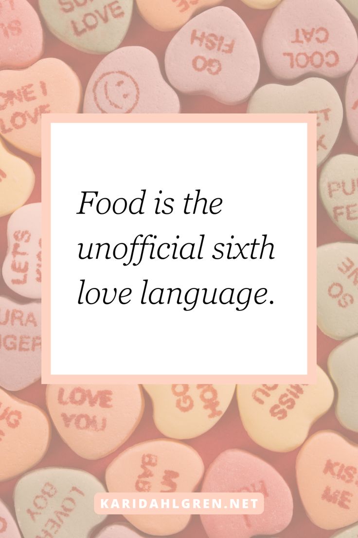 candy hearts with the words food is the official sixth love language