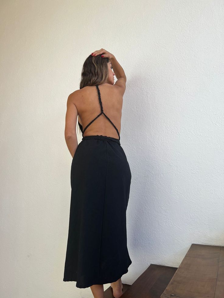 ALLE BOHO "NAOMI" Beach Maxi Dress, features a backless and twisted cotton braid as a detail on the back, Wear it as a bikini cover-up, or for an evening event, the fabric is very light and comfortable. This maxi dress is everything that you want for your next vacation. We are so proud to make Artisanal Clothing using only RAW Cotton that feels and looks very basic and natural. Our clothes do not only look natural and beautiful but they are also made in the most natural and beautiful way. Detail Elegant Backless Strappy Dress For Vacation, Strappy Backless Dress With Cutout For Date Night, Elegant Backless Dress With Strappy Back For Vacation, Cross Back Tie Maxi Dress For Night Out, Beach Halter Neck Backless Dress With Lace-up Back, Summer Backless Dress With Tie Back For Date Night, Black Backless Dress For Vacation, Backless Ruched Dress For Date Night, Halter Neck Backless Dress With Lace-up Back For Beach