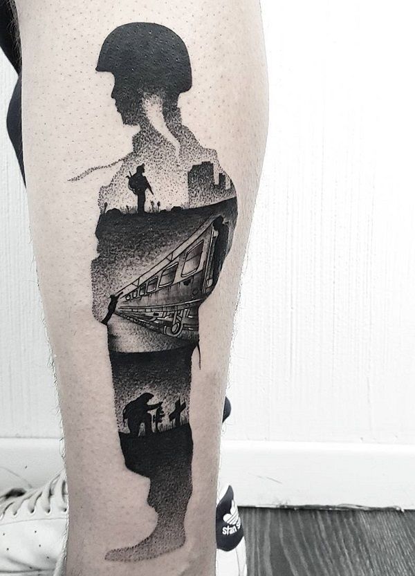 a man's leg with a black and white image of a woman on it