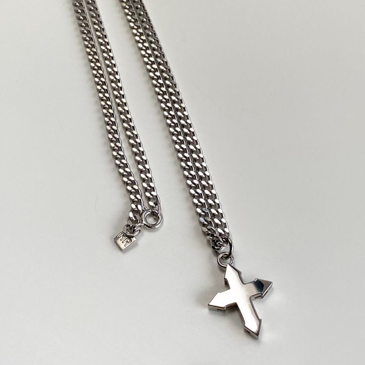 sterling silver | length by choice | price for the set Luxury Silver Stainless Steel Necklace, Luxury Silver Tarnish Resistant Necklaces, Luxury Silver Necklace With Shiny Finish, Tarnish Resistant Sterling Silver Necklace, Hallmarked Silver Stainless Steel Necklaces, White Gold Cross Pendant With Adjustable Chain, White Sterling Silver Tarnish-resistant Necklace, Tarnish Resistant White Gold Cross Jewelry, Luxury Stainless Steel Necklace With Silver Chain