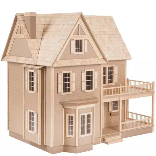 a toy house with stairs and balconies on the top floor, in front of a white background