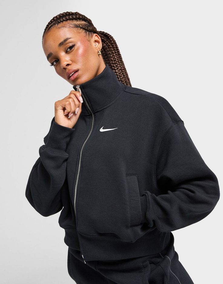 Upgrade your layers with this women's Pheonix Full Zip Track Top from Nike. In a Black colourway, this oversized top is cut from smooth Phoenix fleece for total comfort. It features a full-zip fastening and high-collar for adjustable coverage, with ribbed trims to hold the shape and dropped shoulders for extra room. With side pockets for storage, it's finished up with a Swoosh to the chest. Machine washable | Our model is 5'7" and wears a size small. Chest Machine, Oversized Top, Extra Room, Black Nike, Jd Sports, High Collar, Black Nikes, Phoenix, Track