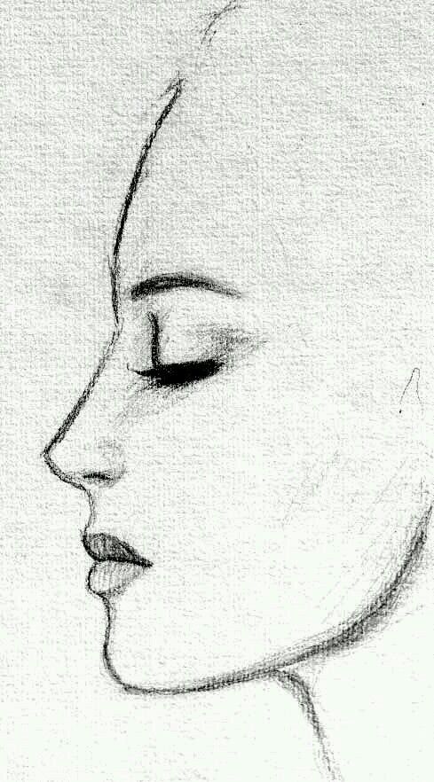 a black and white drawing of a woman's face with her eyes closed to the side