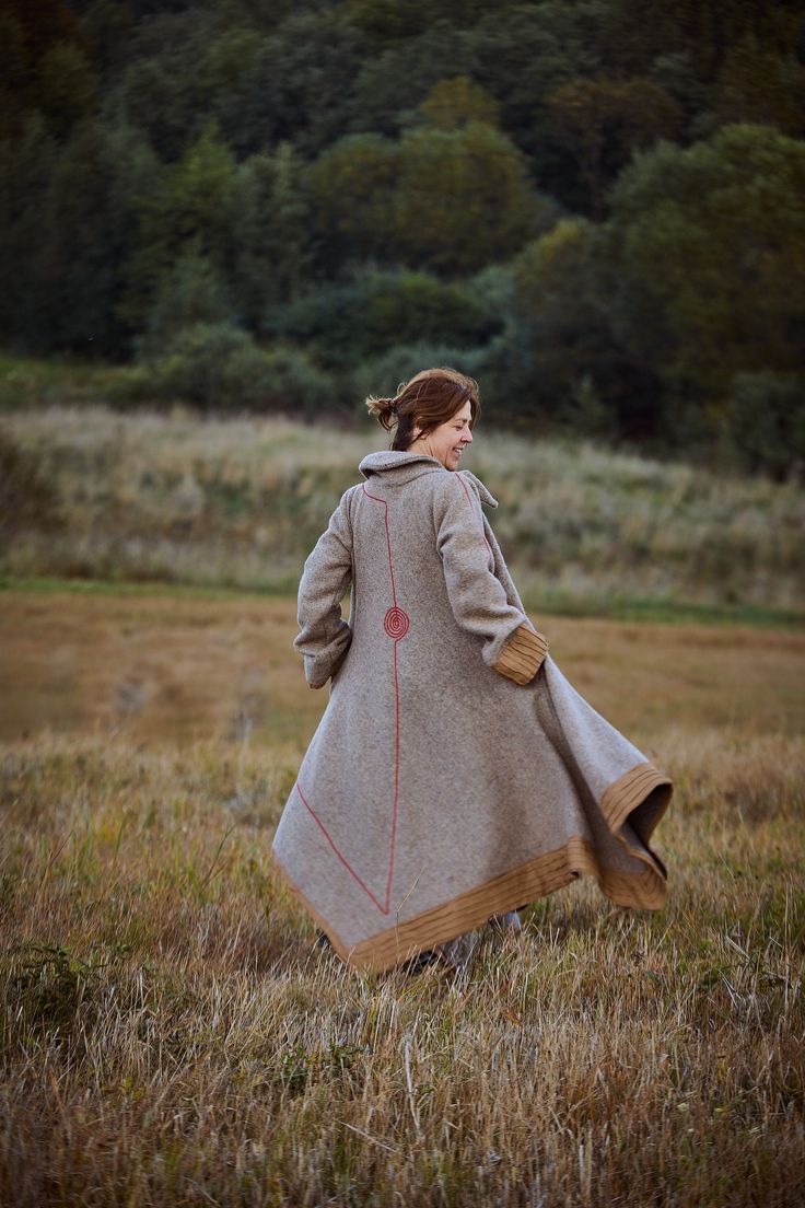 "NEW Military Stylish Bohemian Wool Avant Garde Women Long Coat Autumn Winter Spring Costumer Order by Aiste Anaite This Light Wool long Coat is high quality handmade. The Aistefashion coat is decorated with authentic, woven tapestry. It shows the image of well-knowing Lithuanian church. NEW Bohemian Light long Coat is also embellished with little stones found on the coast of the Baltic Sea. It is gentle, accurate and high quality work. Made to order special for You and Your dimensions. Plus siz Bohemian Style Long Sleeve Outerwear For Larp, Bohemian Long Sleeve Outerwear For Larp, Red Long Coat, Linen Coat, Long Cocktail Dress, Long Coat Women, Reversible Dress, Long Wool Coat, Stylish Coat