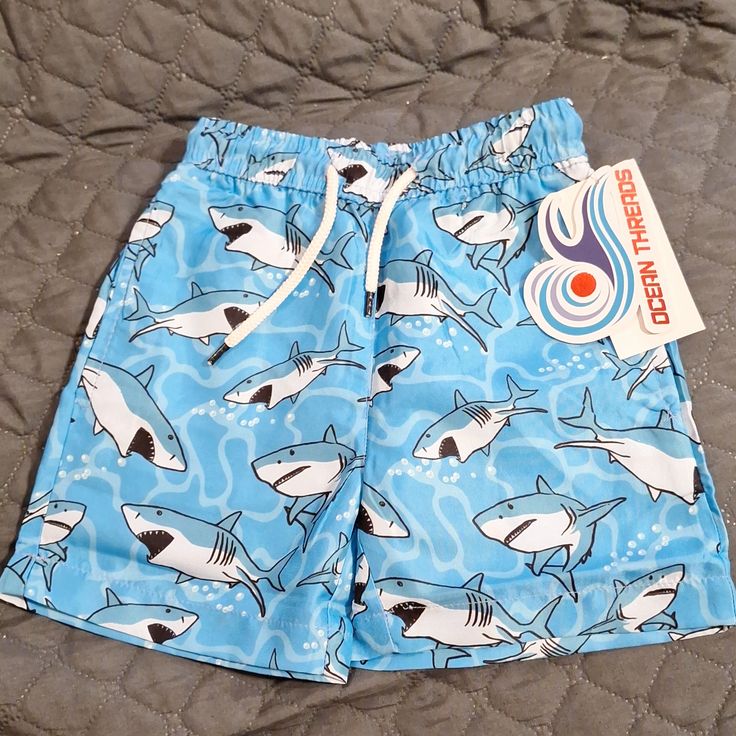 New Toddler Swimming Shorts Inside Shorts Has Mesh Material. 100% Polyester Playful Blue Bottoms With Built-in Shorts, Playful Blue Swim Trunks With Elastic Waistband, Casual Swim Trunks For Playtime At The Beach, Casual Swim Trunks For Beach Season Playtime, Playful Blue Shorts For Beach Season, Casual Short Swim Trunks For Playtime, Casual Summer Swim Trunks For Playwear, Fun Cotton Bottoms For School, Playful Short Bottoms For School