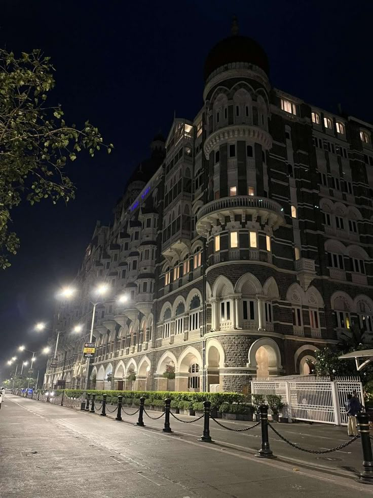 a very tall building lit up at night