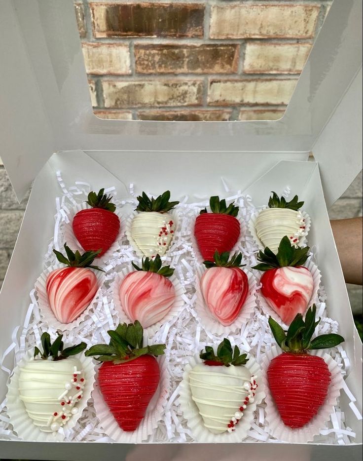 strawberries are arranged in the shape of heart shaped hearts and decorated with icing