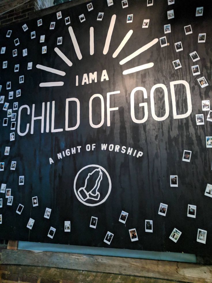 a sign that says i am a child of god on the side of a building