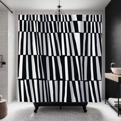 a black and white shower curtain in a bathroom