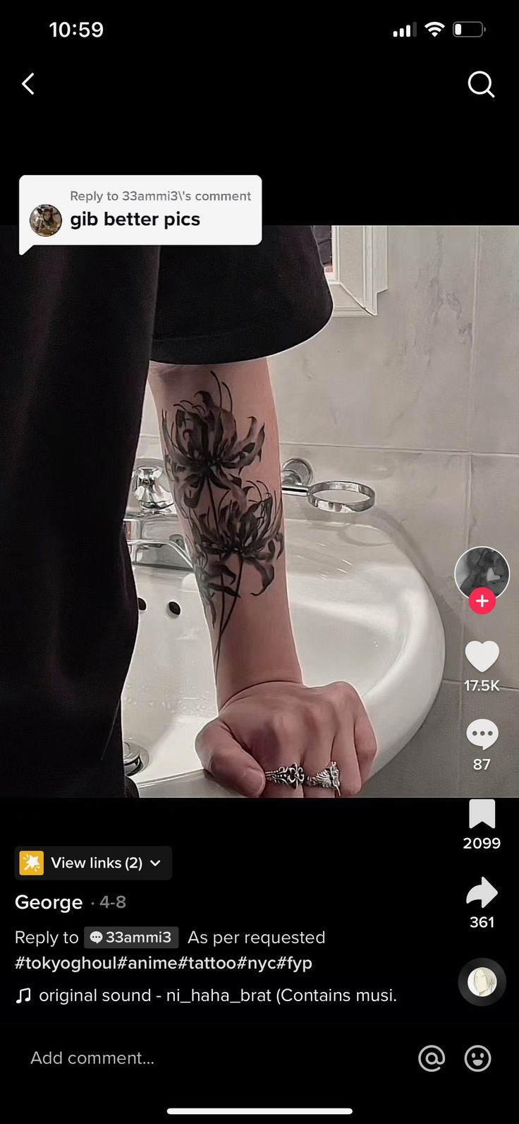 a person with a tattoo on their arm next to a sink