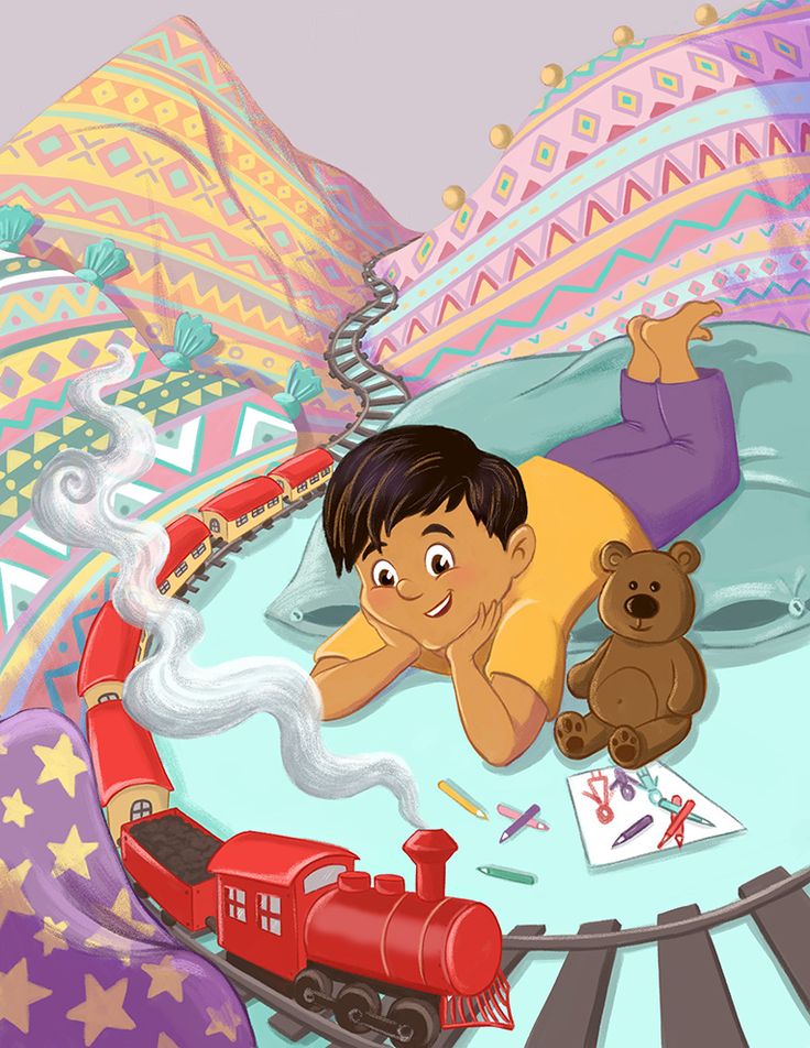 a child laying on the ground next to a toy train and teddy bear with other toys