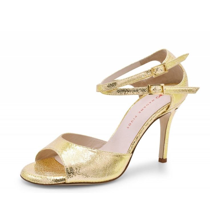 Lovely bright platinum gold embossed leather, fabulously elegant, neutral yet a show stopping design! The double ankle strap with closed back keeps your foot securely in the shoe at all times, from red carpets to dance floors. You can wear the ankle straps crossed or parallel, as the mood strikes you. This sandal beautifully supports your foot with the single toe band. The shoe is finished with a subtle signature brilliant adornment on the left heel. With a soft memory foam foot bed padding, you