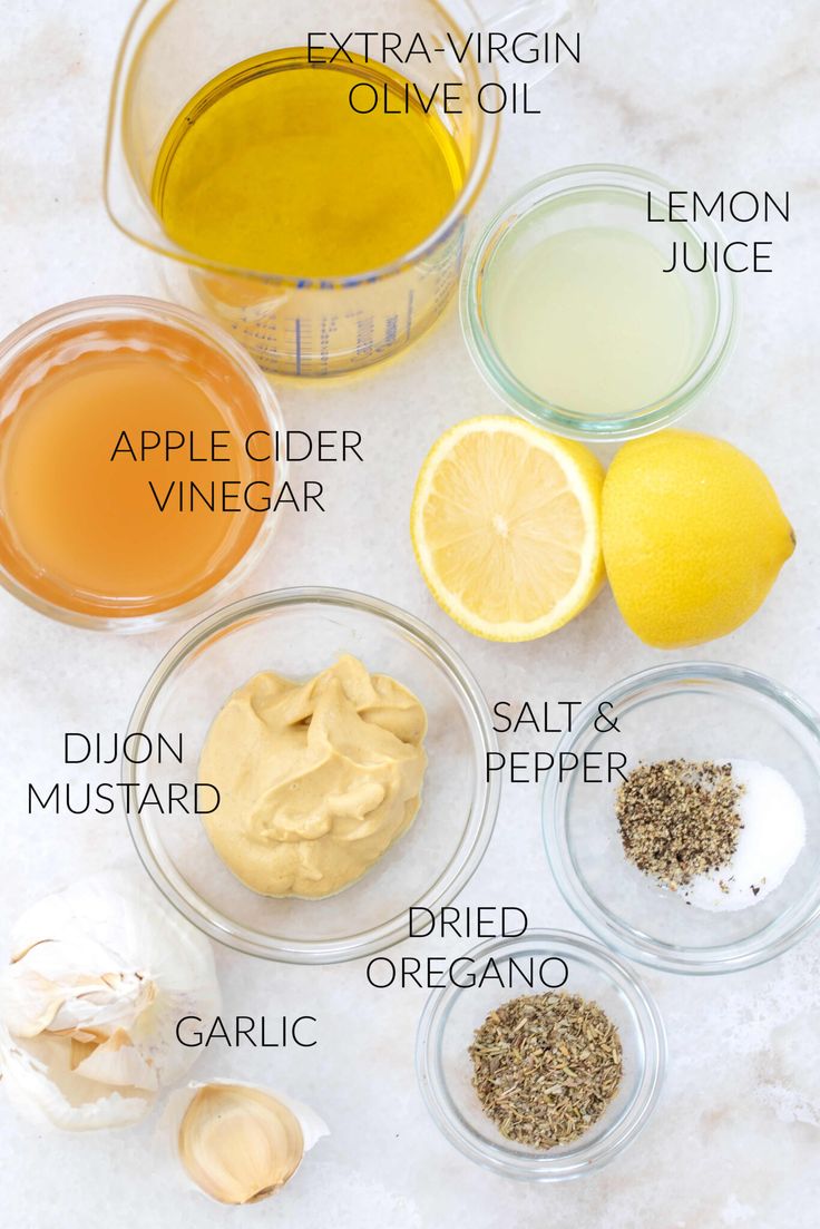 the ingredients to make an apple cider vinegar recipe are shown in bowls on a marble countertop