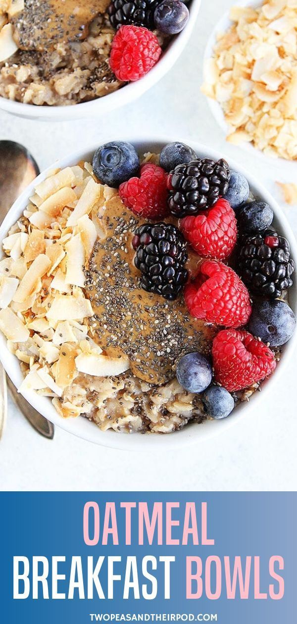 oatmeal breakfast bowls with berries and granola in the middle on a white table