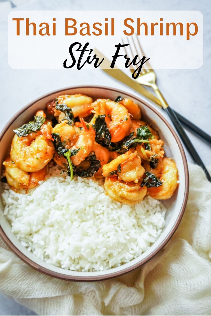 thai shrimp stir fry in a bowl with white rice and silverware on the side