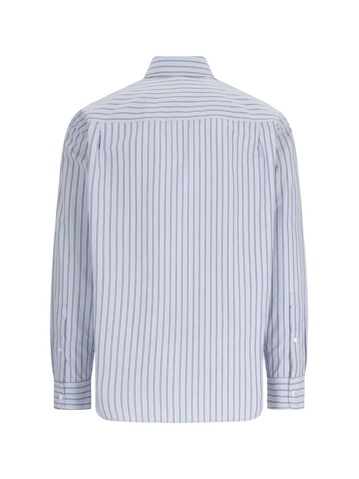 Closed striped shirt in light blue cotton with black stripe pattern, classic collar, button closure, logo embroidery on the chest, button cuffs, curved hem. Composition: 100% organic cottonSize and Fit: loose product made from organic materials Blue Cotton Shirt With Signature Stripes, Blue Cotton Shirt With Contrast Stripes, Blue Shirt With Signature Stripes For Work, Blue Cotton Shirt With Striped Cuffs, Collared Cotton Shirt With Signature Stripes, Cotton Button-up Shirt With Signature Stripes, Pinstripe Cotton Shirt For Work, Pinstripe Cotton Top With Spread Collar, Striped Cotton Shirt With Placket