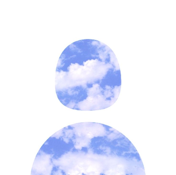 the sky and clouds are reflected in two circles on a white surface with blue skies