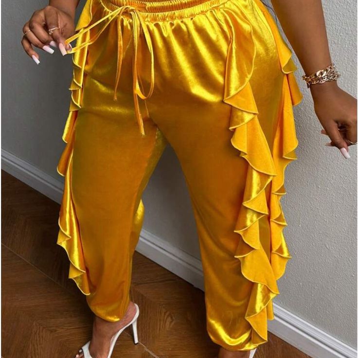 Brand New Ruffled Joggers For Any Occasion Chic Yellow Bottoms With Ruffles, Chic Yellow Ruffled Bottoms, Gold Bottoms For Spring Party, Gold Party Bottoms For Spring, Yellow High Waist Bottoms For Party, High Waist Yellow Bottoms For Party, Yellow Casual Party Bottoms, Casual Yellow Bottoms For Party, Casual Yellow Party Bottoms