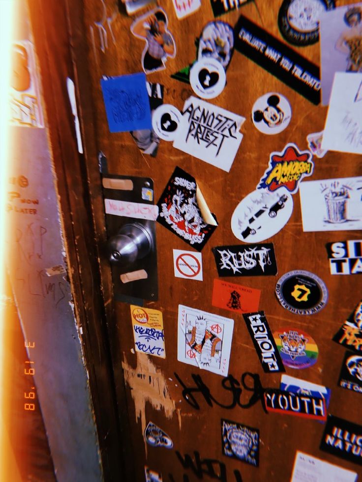 a door with many stickers on it