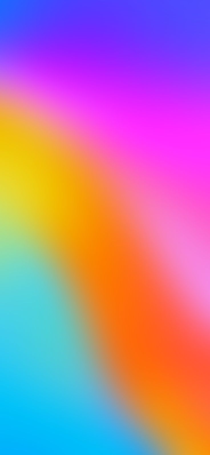 a blurry image of an orange, blue and pink background with the colors red