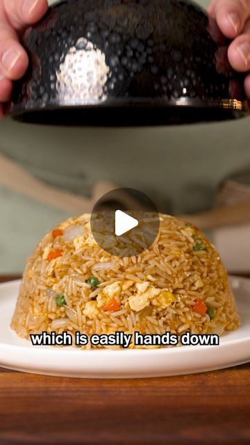 a person is holding a bowl with food on it and the words which is easily hands down