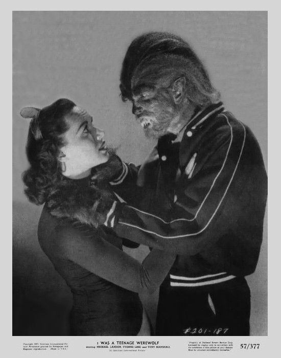 an old black and white photo of a man in uniform holding a woman's head