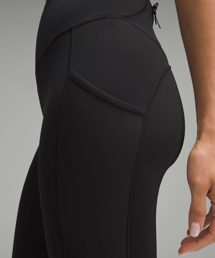 100% Pure Running Freedom. This Version Of Our Fast And Free Tights Features Reflective Details And A Mesh Side Pocket For Storing Safety Lights On Early Morning And Late Night Runs. Designed For Running. Intended To Sit Above Ankle. Back Zippered Pocket. One Zippered And One Mesh Pocket On The Legs. Continuous Drawcord Is Easy To Cinch, Wont Get Lost In The Wash, And Helps Keep Your Leggings In Place So You Dont Have To Pull Them Mid-Run. Reflective Details. | Fast and Free High-Rise Tight 25" Leisure Clothes, Running Accessories, Safety Lights, Fitness Gear, Short Coat Jackets, Dress Bra, Running Tights, High Rise Leggings, Lululemon Leggings