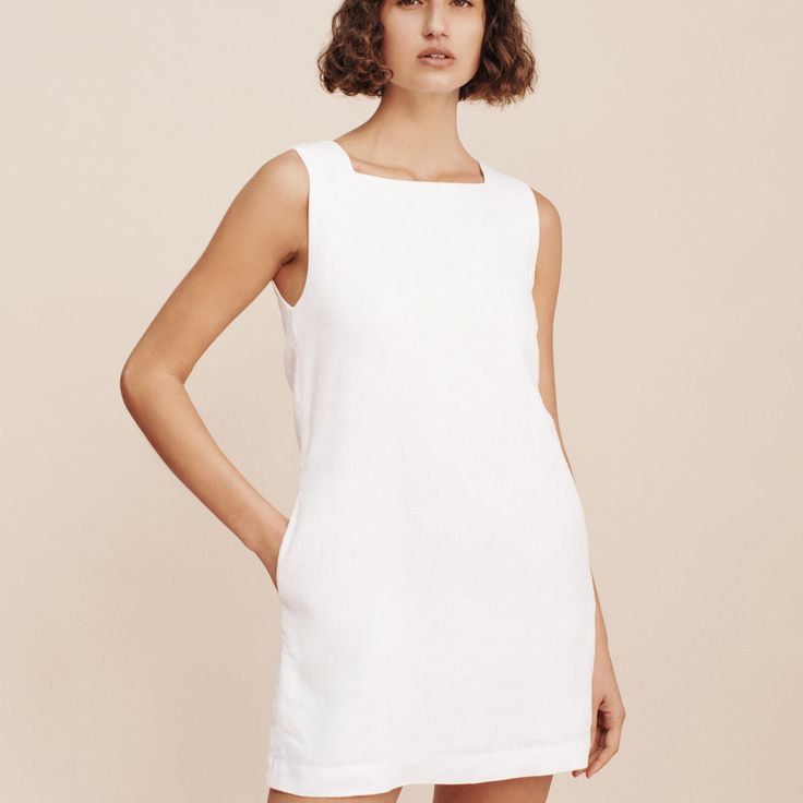 Chic Unlined Linen Dress With Straight Neckline, Chic White Linen Dress For Work, Chic White Linen Workwear Dress, White Linen Dress With Straight Neckline For Summer, White Linen Dress With Straight Neckline, Unlined Linen Dress With Straight Neckline For Spring, Elegant White Unlined Linen Dress, Classic Linen Dress For Summer Daywear, Classic Summer Dress With Straight Neckline