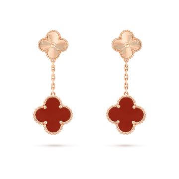 Add a touch of elegance to any outfit with our Clover Earrings in Gold and Carnelian. The intricate design and vibrant gemstones will bring a pop of color to your look. Perfect for any occasion, these earrings offer a unique and stylish way to feel confident and beautiful. ADDITIONAL INFORMATION Color: Gold, Red Stone: Carnelian Ref. VCARO9II00 Material:- 925 Sterling Silver - 18k Gold Plated- 18k Real Gold ( contact us via instagram) Our replica products are committed to quality and color when Luxury Red Sterling Silver Jewelry, Luxury Polished Finish Earrings For Gift, Designer Yellow Gold Drop Earrings, Elegant 14k Gold Gemstone Earrings, Elegant 14k Gold Earrings With Gemstones, Luxury Red Pierced Jewelry, Luxury Red Dangle Jewelry, Luxury Dangle Jewelry With Polished Finish, Designer Dangle Earrings For Formal Events