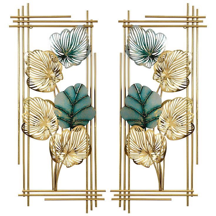 two golden metal sculptures with blue flowers and leaves on them, against a white background