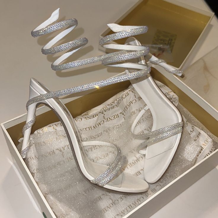 Brand New Rene Caovilla Wrap Sandals Us Size 7. Perfect For Brides Or Black Tie Events/Weddings!! Paid 1,800 With Tax! Poshmark Will Authenticate! No Low Balls You Will Be Blocked! Elegant White Evening Sandals, Elegant White Sandals For Gala, Elegant Fitted White Sandals, Glamorous White Sandals With Heel Strap, Luxury Gala Wedding Shoes With Heel Strap, Glamorous White Pointed Toe Sandals, Luxury Open Toe Wedding Shoes With Wrapped Heel, Luxury Evening Wedding Shoes With Heel Strap, Luxury Wedding Shoes With Heel Strap For Evening