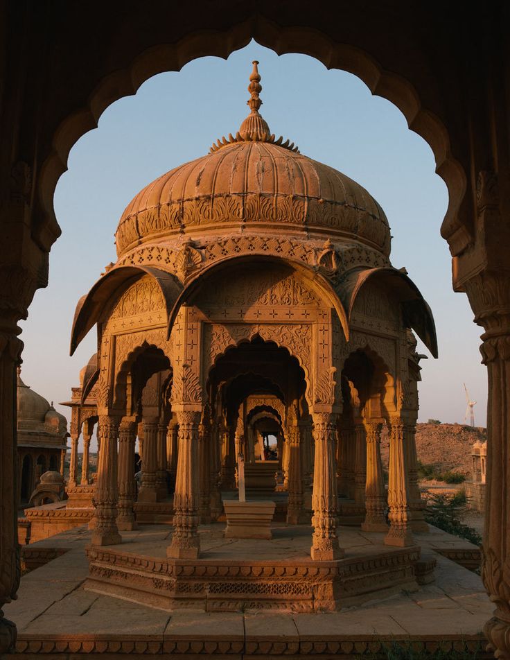 an ornate building with pillars and arches