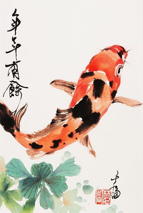 an orange and black koi fish with chinese writing on it