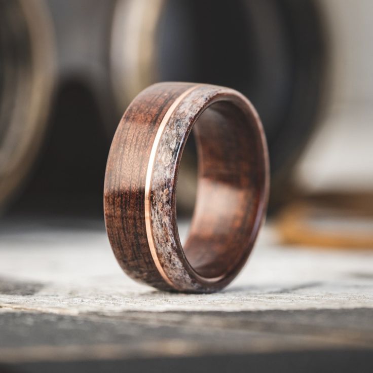 a wooden ring sitting on top of a table