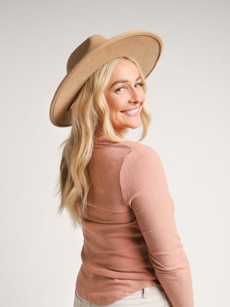 Our favorite fall looks are complete without a boutique hat! Throw on the "Fall Favorite Felt Hat" with a cute dress, booties, and a layered necklace for a winery day with friends. These hats are also perfect for a Nashville trip with a denim jacket, skort, and cowboy boots! PRODUCT DETAILS: Felt Hat 4 Color Options - Bone/Taupe, Tan/Whiskey, Black/Whiskey, Black/Black Faux Leather Band Gold Hardward MATERIAL AND CARE: 100% Polyester Hand Wash Gently and Separately or Dry Clean SIZING INFORMATIO Fitted Fedora Hats For Fall, Wide Brim Fedora For Fall, Wide Brim Winter Hat For Day Out, Winter Wide Brim Hat For Day Out, Chic Brown Hat For Fall, Chic Brown Fall Hat, Chic Fitted Brown Fedora, Fall Fedora Hats For Rodeo, Fall Rodeo Fedora Hat