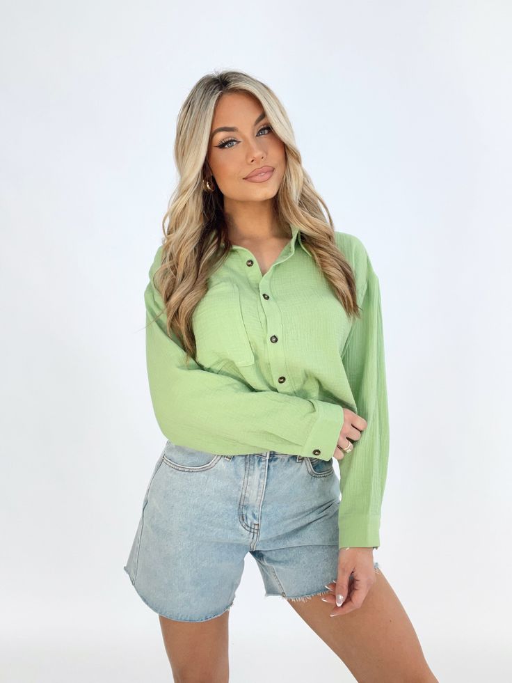 Introducing our bold and bright lime button down shirt. Designed with a collared neckline, button closures, and pocket details - this shirt is perfect for spring and summer. The trendy cropped length adds an elevated and chic touch to any casual brunch date or dinner and drinks outing. Made from soft, stretchy, and lightweight fabric for ultimate comfort. Shell 100% Cotton Hand wash cold. Brunch Date, Rib Cage, Pocket Detail, Egift Card, Top Dress, Lightweight Fabric, Button Downs, Button Down Shirt, Hand Wash