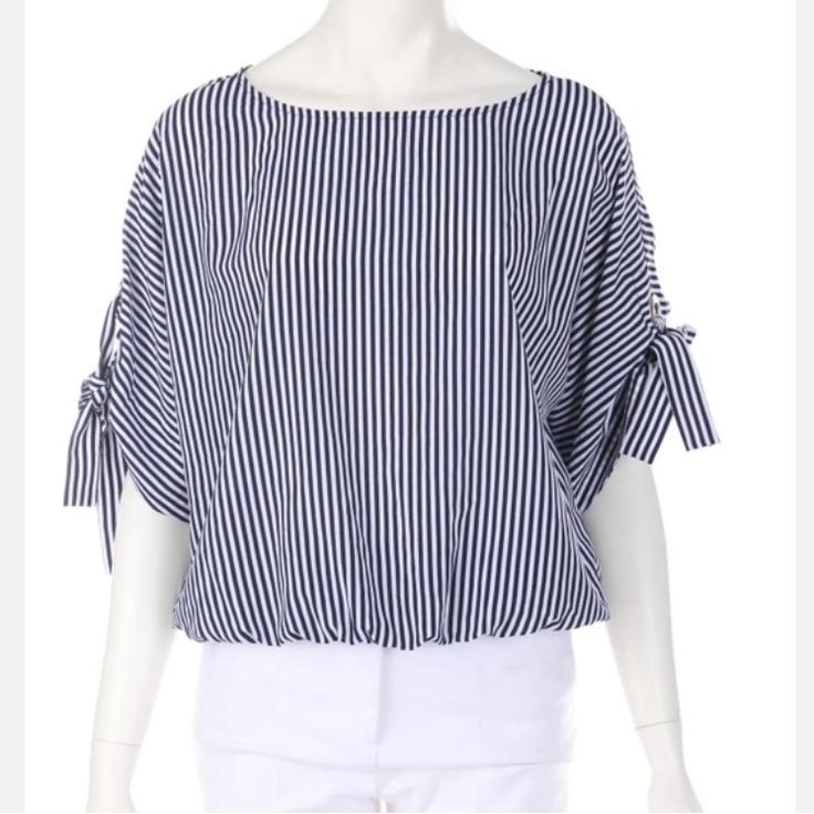 New Navy Blue And White Striped Michael Kors Top With Rollup Sleeves And Banded Waist. Measures 24 Inches Long And 22 Inches Armpit To Armpit. Chic Navy Tops For Vacation, Navy Tops For Spring Vacation, Navy Spring Vacation Top, Classic Blue Horizontal Stripe Tops, Blue Horizontal Stripe Pattern Tops, Blue Horizontal Stripe T-shirt For Summer, Blue Vertical Striped Collared Top, Blue Summer T-shirt With Horizontal Stripes, Silk Halter Top