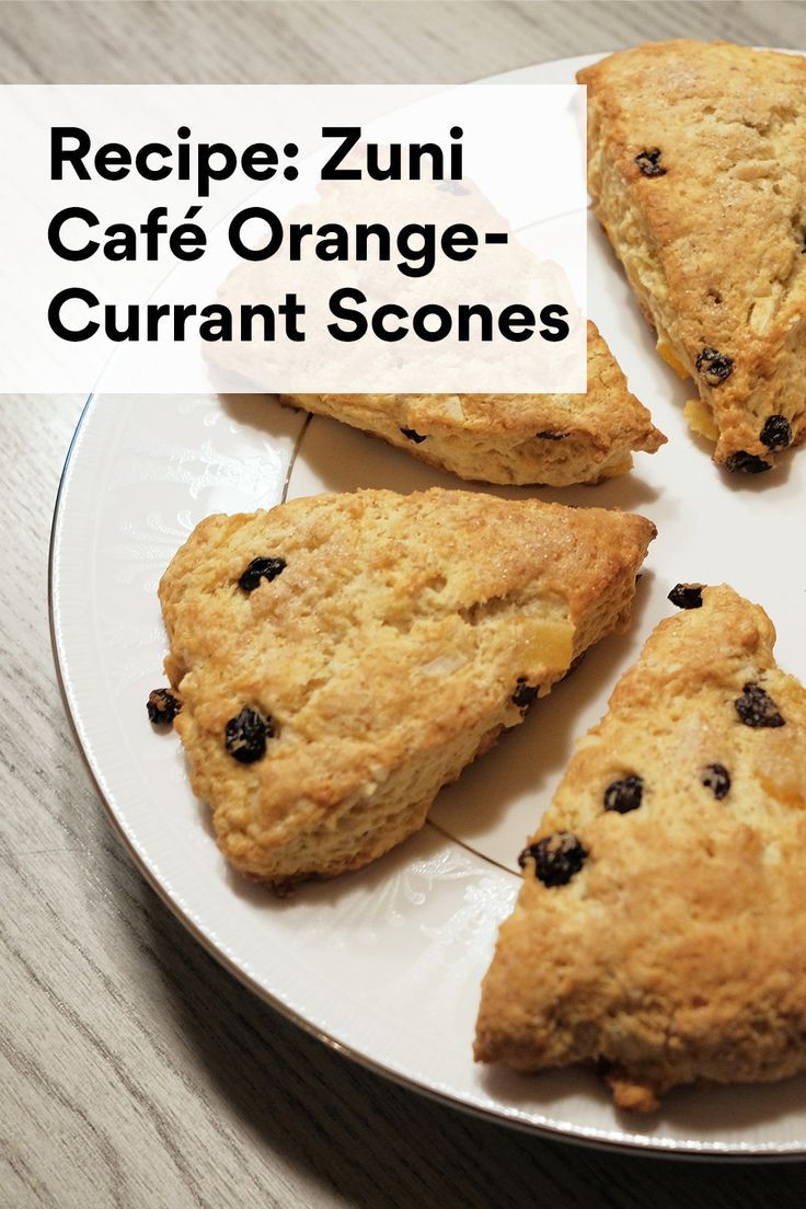 four scones on a plate with the words recipe zuni cafe orange - currans