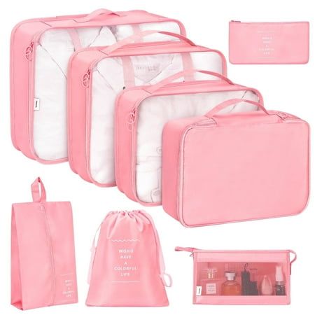 six pieces of pink and white luggage with zippered pouches on the bottom, one in