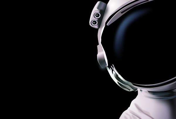 an astronaut's helmet is shown in the dark