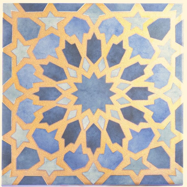 an intricately designed tile with blue and yellow colors