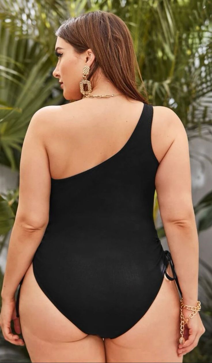 One-shoulder Swimsuit Bodysuit For Beach Season, One Shoulder Bodysuit For Swimming Beach Season, One-shoulder Bodysuit For Swimming And Beach Season, One-shoulder Bodysuit For Beach Season Swimming, Black One-shoulder Bodysuit For Swimming, Fitted One Shoulder Tankini For Vacation, Fitted One-shoulder Tankini For Vacation, One-shoulder Stretch Swimwear For Beachwear, One Shoulder Bodysuit For Poolside