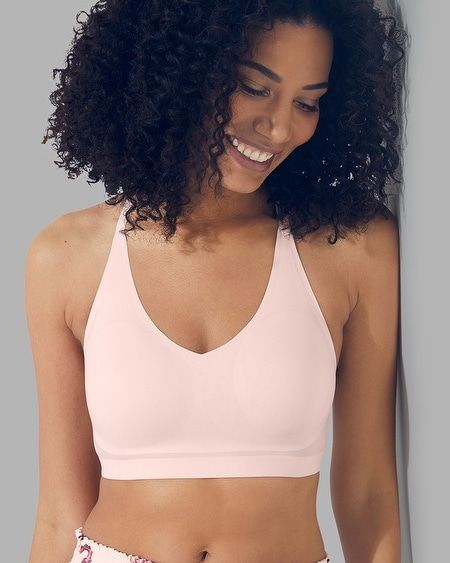 Why you’ll love it: This ultra-soft wireless bralette gives you 24/7 comfort and all the support without the wires. The adjustable racerback straps are perfect under tank tops, and the back lace detail is too pretty to hide. Comfortable style with Soma Intimates. Details V-shape in front to wear with multiple necklines. Wireless. Blissfully soft brushed fabric. Wide, soft band offers support. Full-coverage removable pads for natural shape. Back lace detail feels soft against your skin. 72% nylon Soma Bras, Soma Intimates, Swim Skirt, Under Dress, Swim Fashion, Nursing Bra, One Piece Suit, Support Bras, Sporty Outfits