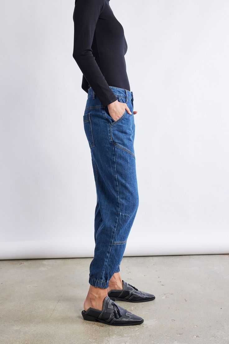 A new kind of denim pant: these relaxed fit pants are so comfortable they feel like loungewear. Made with a unique light denim fabric to fit in seamlessly with the rest of your wardrobe. Designed to have a jogger-style silhouette but look and feel like soft denim. Jogger style light denim fabric Elastic ankle cuff Elastic back waistband 2 back pockets, 2 side pockets Belt loops Button and zip front closure Relaxed Straight Leg Denim Jeans, Casual Medium Wash Tapered Cargo Jeans, Casual Tapered Leg Medium Wash Cargo Jeans, Casual Denim Blue Tapered Leg Jeans, Casual Tapered Leg Jeans In Denim Blue, Casual Tapered Leg Denim Blue Jeans, Relaxed Mid-rise Denim Jeans, Everyday Medium Wash Cargo Jeans, Relaxed Medium Wash Jeans With Pockets